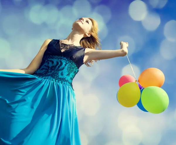 Redhead girl with colour balloons — Stock Photo, Image