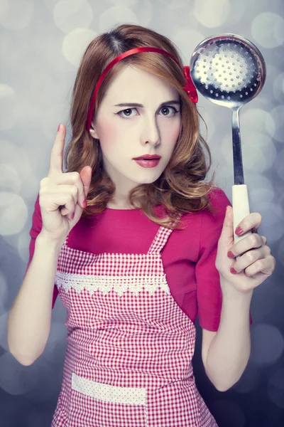 Redhead housewife with soup ladle — Stock Photo, Image