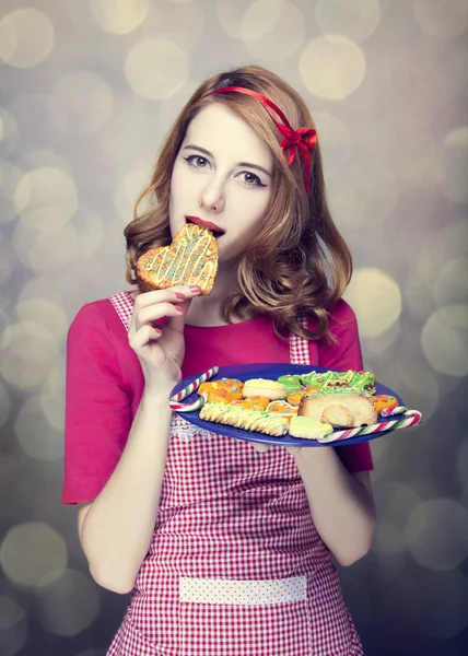 Roodharige vrouwen met cookies — Stockfoto