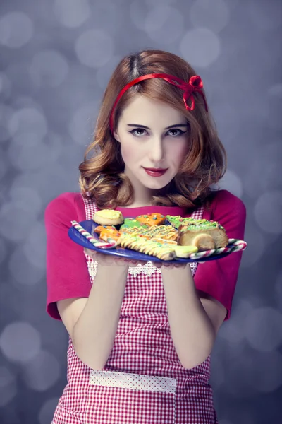 Roodharige vrouwen met cookies — Stockfoto