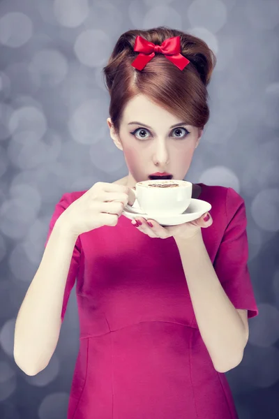 Redhead girl with coffee cup. St. Valentine Day. — Stock Photo, Image