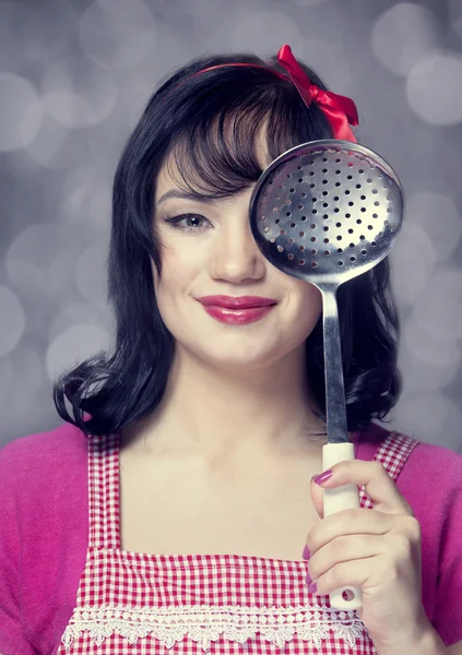 Brunette housewife with soup ladle — Stock Photo, Image