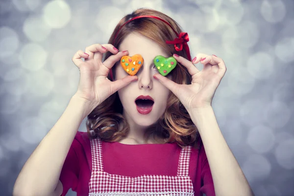 Donne rosse con biscotti — Foto Stock