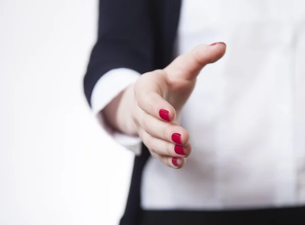 Business woman smiling and hold hand for handshake. Studio shot. — Stock Photo, Image