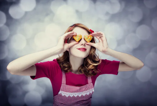 Redhead women with cookies — Stock Photo, Image