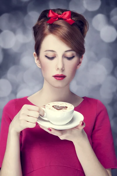 Redhead girl with coffee cup. St. Valentine — Stock Photo, Image