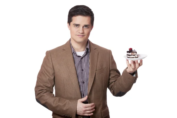 Man in suit holds cake, isolated on white — Stock Photo, Image