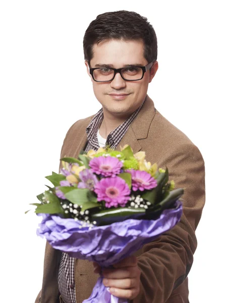 Homem com flores na mão — Fotografia de Stock