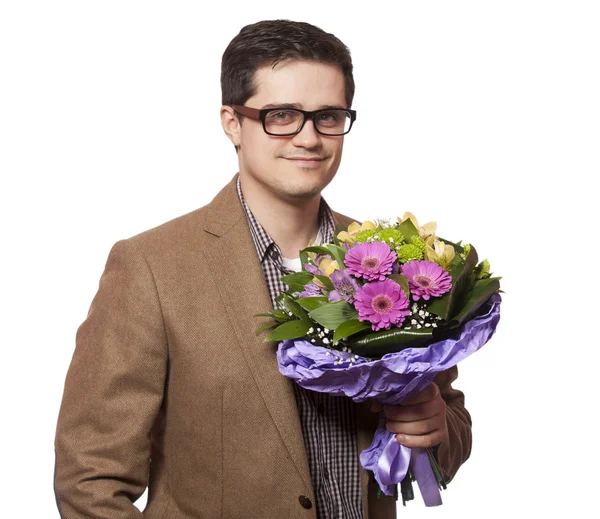 Mannen med blommor i handen — Stockfoto