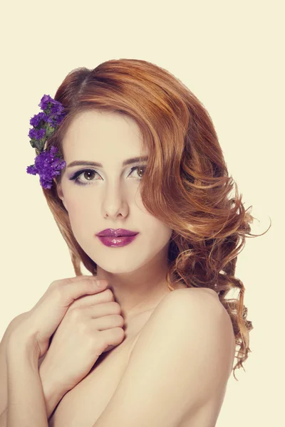 Redhead girl with flower, isolated. — Stock Photo, Image