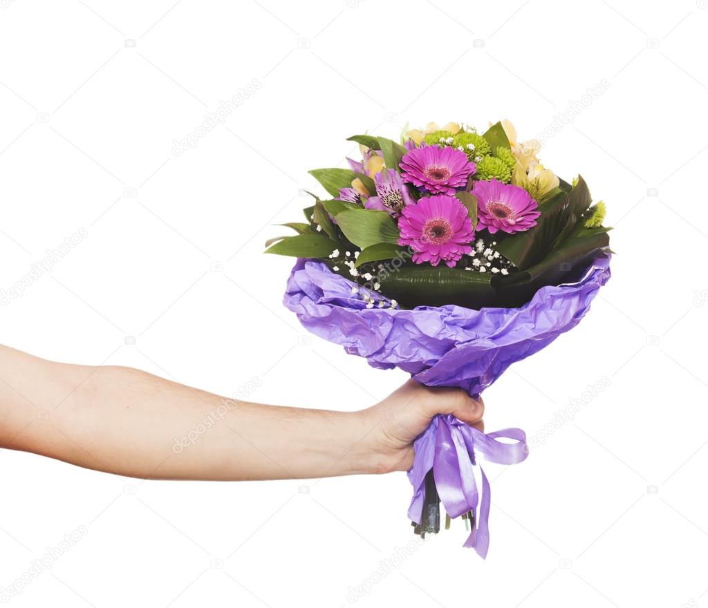 hand with a flowers isolated on white