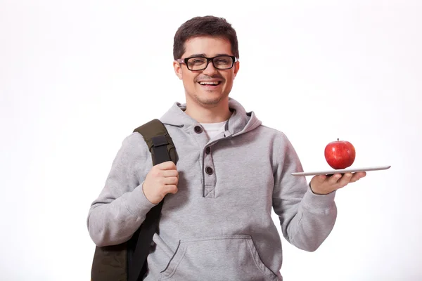 Young man with red apple — Stock Photo, Image