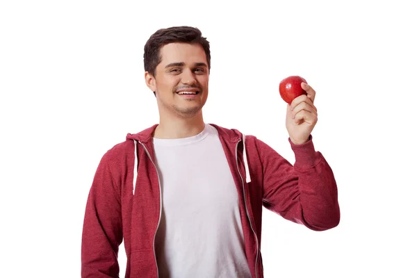 年轻男子穿白衬衣和与红苹果 — 图库照片