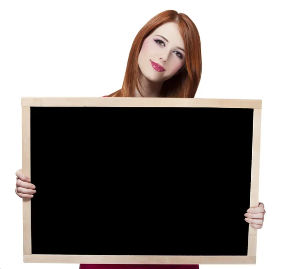 Redhead student with blackboard. — Stock Photo, Image