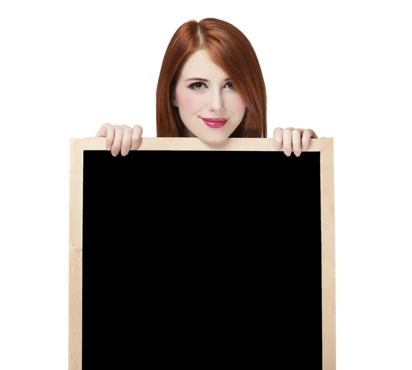 Redhead student with blackboard. — Stock Photo, Image