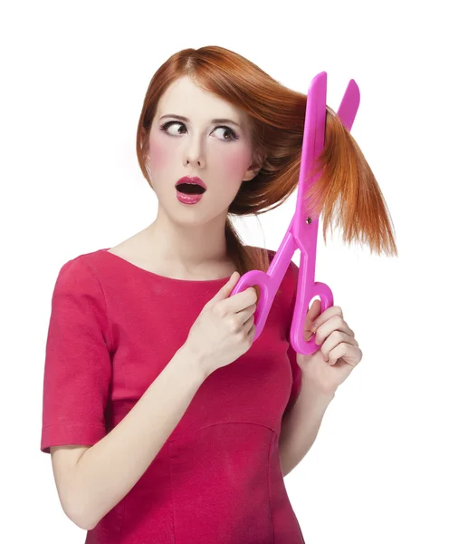 Redhead girl with big scissors — Stock Photo, Image