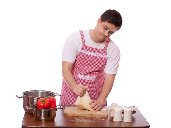 Trauriger Mann versucht zu kochen. — Stockfoto