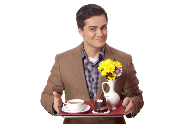 Man in suit holding tray with sweet breakfast — Stock Photo, Image