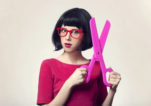 Girl with big scissors — Stock Photo, Image