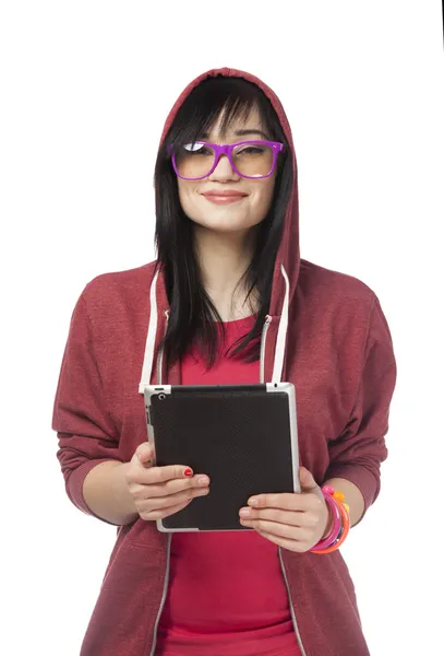 Teen girl in red with tablet at white background. — Stock Photo, Image