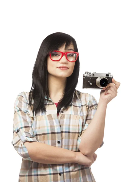 Adolescente en rouge avec caméra sur fond blanc — Photo