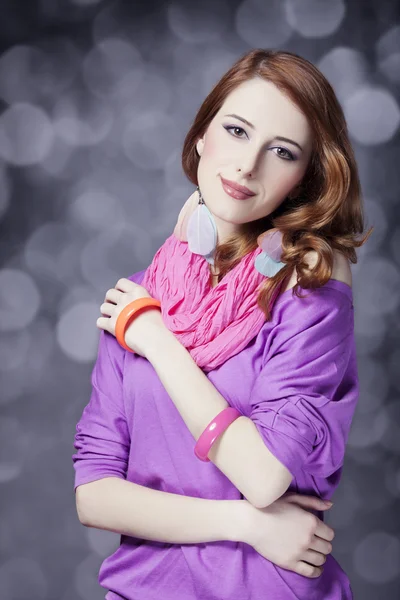 Beautiful red-haired girl at bokeh background — Stock Photo, Image