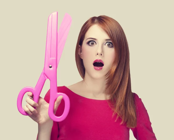 Redhead girl with big scissors — Stock Photo, Image