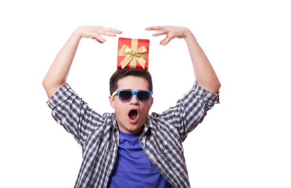 A man with present box on the head, white background. — Stock Photo, Image