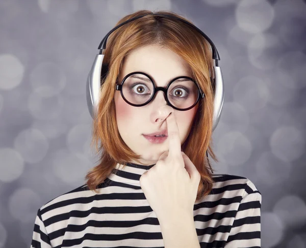 Funny girl with headphone and glasses. — Stock Photo, Image