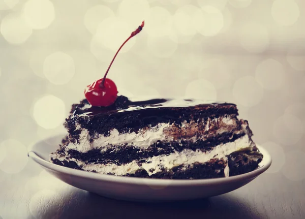 Cherry cake. Photo in old vintage color image style. Focus on ch — Stock Photo, Image