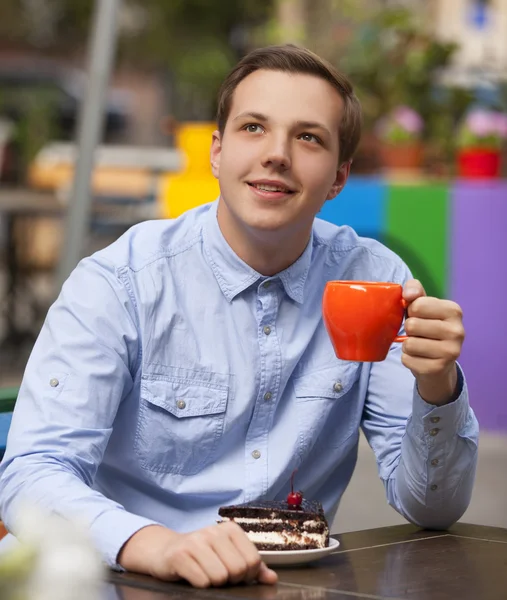 Young man in the cafe — Stock Photo, Image