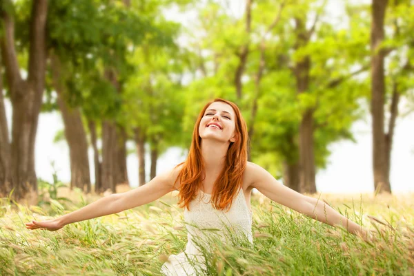 Redhead girl at outdoor Royalty Free Stock Photos