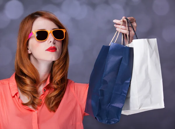 Redhead women with sopping bags. — Stock Photo, Image