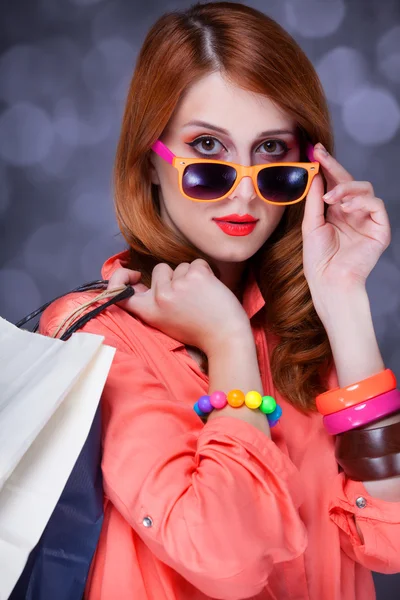 Redhead women with sopping bags. — Stock Photo, Image