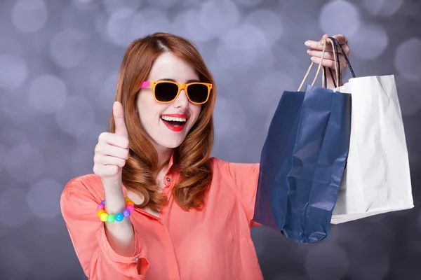 Redhead women with sopping bags. — Stock Photo, Image