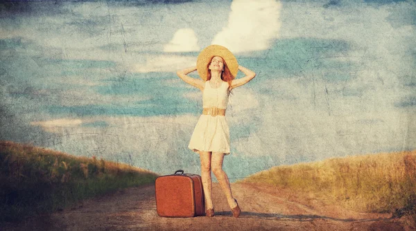 Redhead girl with suitcase at outdoor. — Stock Photo, Image