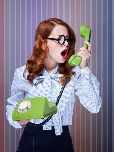 Women with green telephone — Stock Photo, Image