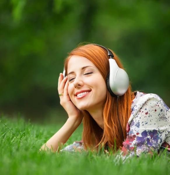 Girl with headphones at outdoor — Stock Photo, Image