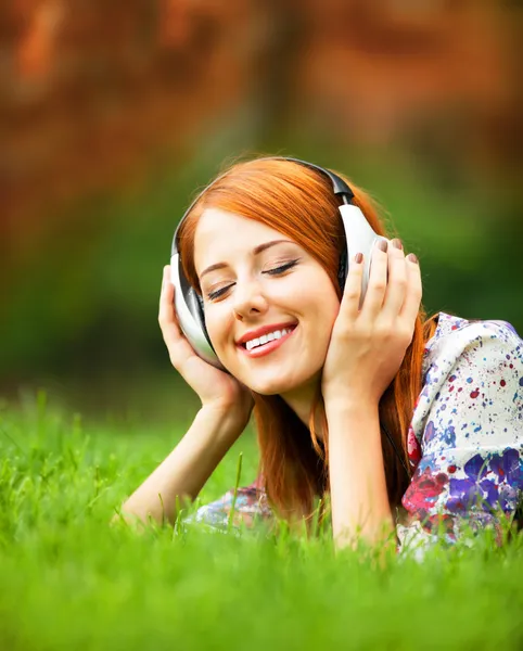 Girl with headphones at outdoor — Stock Photo, Image