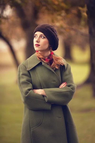 Style redhead girl at beautiful autumn outdoor — Stock Photo, Image