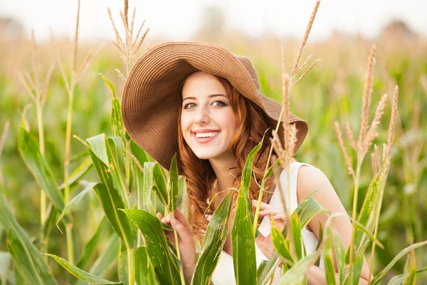 Redhead girl in corn field — Stock Photo, Image