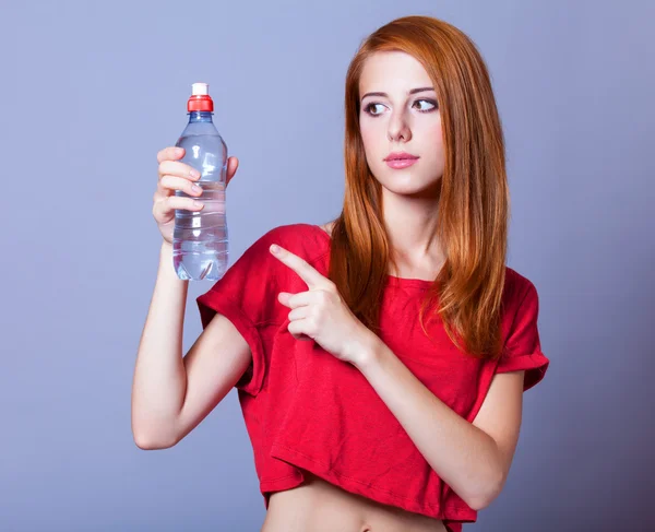 Sport woman with bottle. — Stock Photo, Image