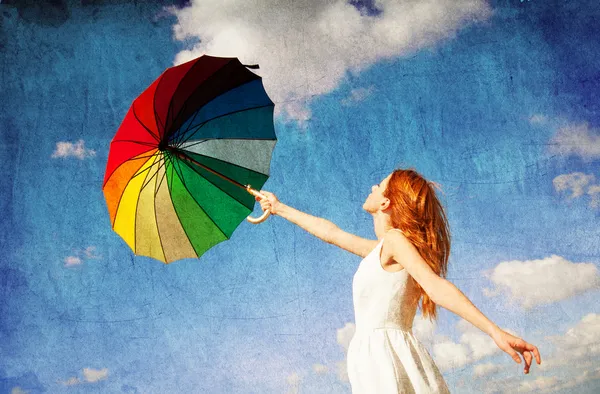 Girl with umbrella at sky background. — Stock Photo, Image