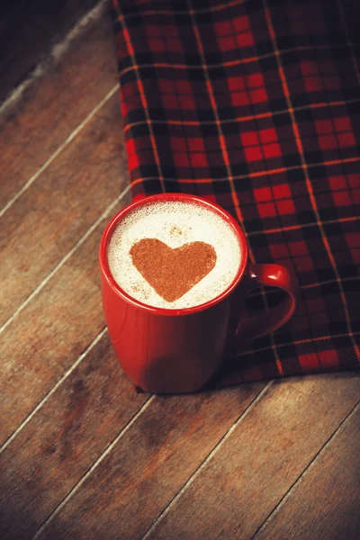 Cup of coffee with tartan — Stock Photo, Image