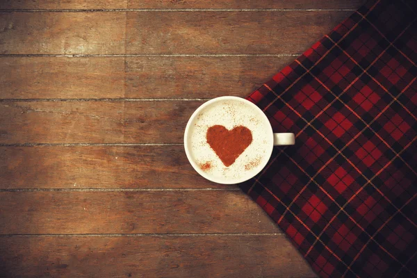 Cup of coffee with tartan — Stock Photo, Image
