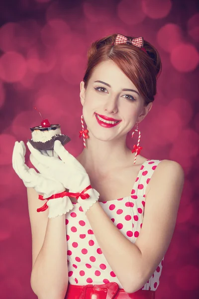 Beautiful redhead women with candy. — Stock Photo, Image
