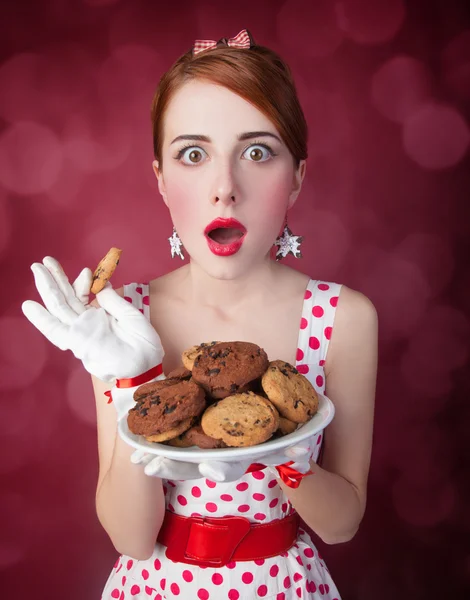 Belle donne rosse con coockie — Foto Stock