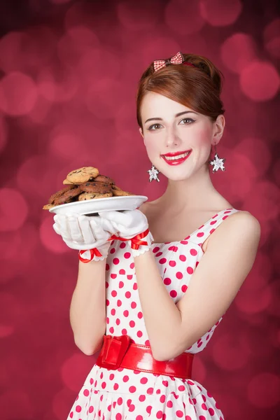 Hermosa pelirroja mujeres con coockie — Foto de Stock