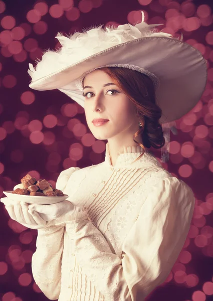 Hermosas mujeres pelirrojas con dulces . —  Fotos de Stock