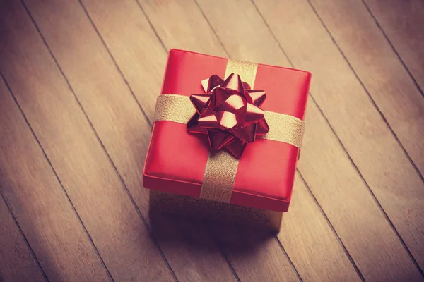 Christmas gift box on wooden table — Stock Photo, Image